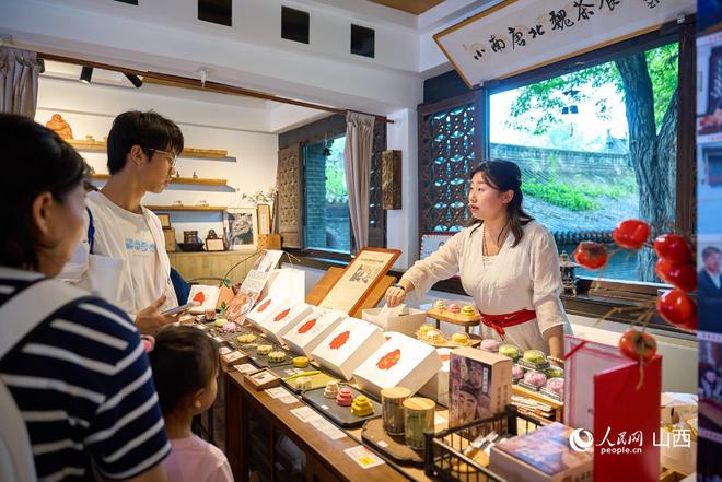 走进民企看发展山西小南唐：漫步云冈从北魏茶食中品历史醇厚(图2)